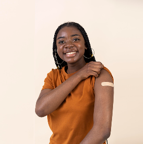 women showing arm after vaccine